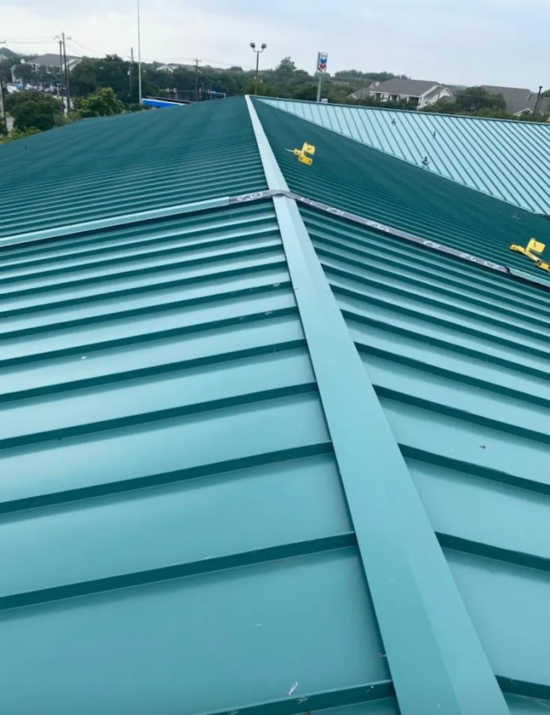 Green commercial metal roof ridge and valley for Metal Roof Repair in Benbrook